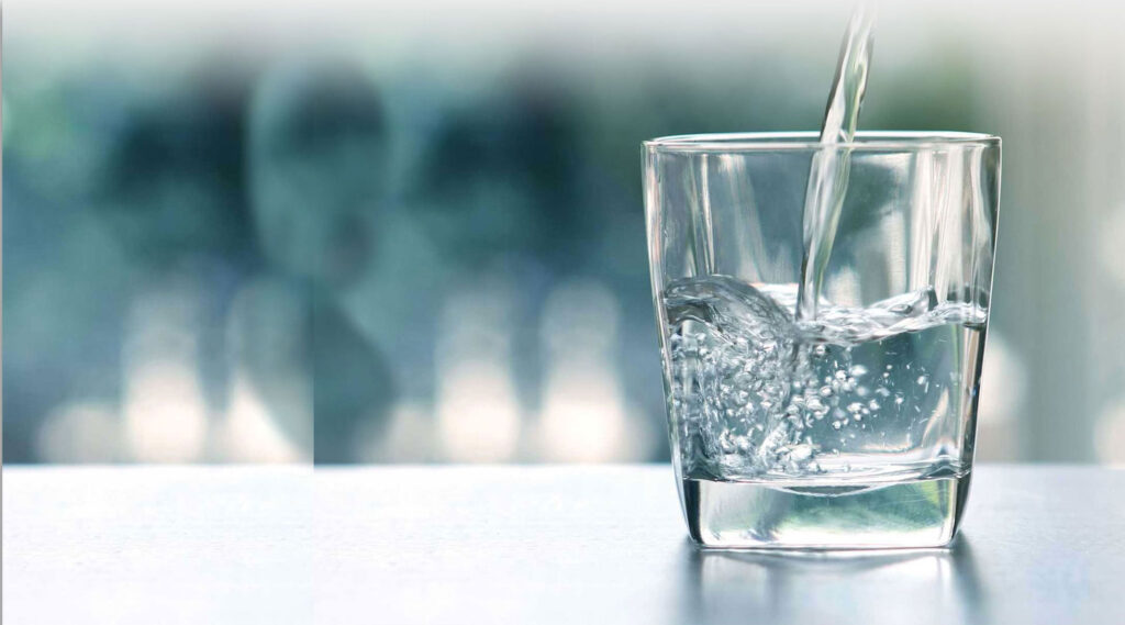 Is Distilled Water Safe to Drink - a glass of water being poured